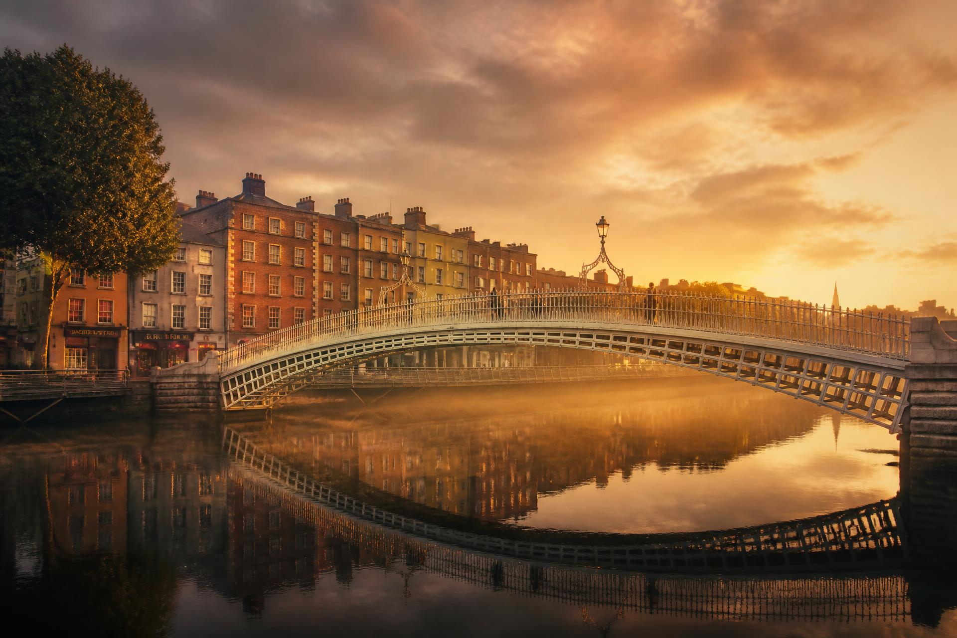 The Ha'penny Bridge over the River Liffey at golden hour